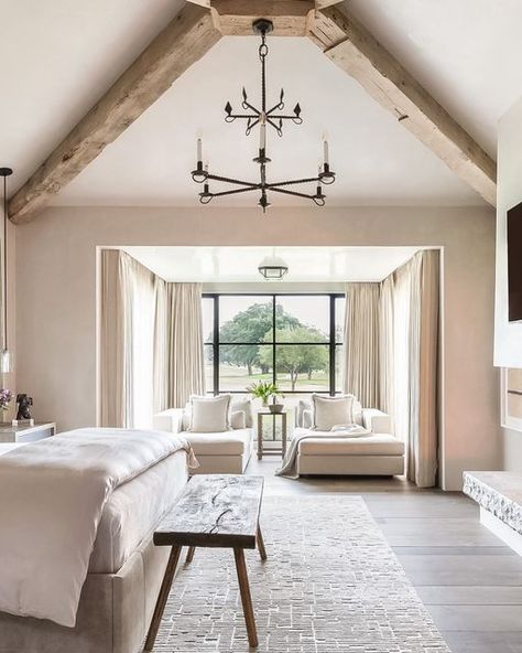 Kara Childress - Interior Design on Instagram: "This layered bedroom nook features two chaise lounges encapsulated by perfectly paired working drapery and sheers" Coffered Ceiling Master Suite, Beams In Tray Ceiling Master Bedrooms, Primary Bedroom Tray Ceiling, Master Bed Tray Ceiling, Layered Bedroom, Palecek Ottoman, Sitting Nook, Rustic Luxury, Bedroom Sitting Room