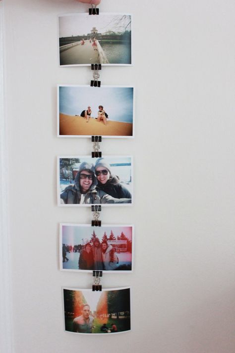 Create an effortless photo display (that looks more thoughtful than tape and more interesting than frames) by linking clips together. See more at Poster »  - GoodHousekeeping.com Binder Clip Hacks, Photo Chain, Binder Clips, Pretty Designs, Juice Bar, Home Organization Hacks, Trendy Home, Diy Photo, Diy Hacks