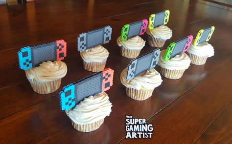 Nintendo Switch Cupcake Toppers | Video Game CakeToppers | Cake Toppers| Perler Toppers | Custom Made | Reusable | Gamers | Party Decoration by TheSuperGamingArtist on Etsy https://www.etsy.com/listing/663081210/nintendo-switch-cupcake-toppers-video Nintendo Switch Cake, Graduation Video, Nintendo Party, Video Game Cakes, Emoji Cake, Video Games Birthday Party, Video Game Party, Video Games Birthday, Salty Cake