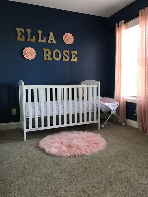 Navy accent Wall Rose Wall Hanging Navy Blue And Gold Nursery, Blue Pink Nursery, Navy Blue And Pink Nursery, Navy Blue Nursery Girl, Navy Wallpaper Accent Wall, Wallpaper Accent Wall Nursery, Navy And Pink Nursery, Pink And Navy Nursery, Accent Wall Nursery