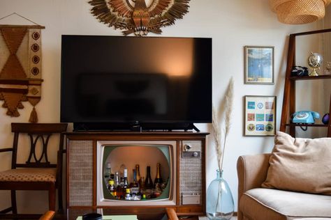 Living room with media center/bar cart combination TV stand Fireplace Apartment, Ikea Coffee Table, White Couches, Bedroom Photos, Retro Tv, White Rooms, Studio Apartment, Apartment Therapy, One Bedroom