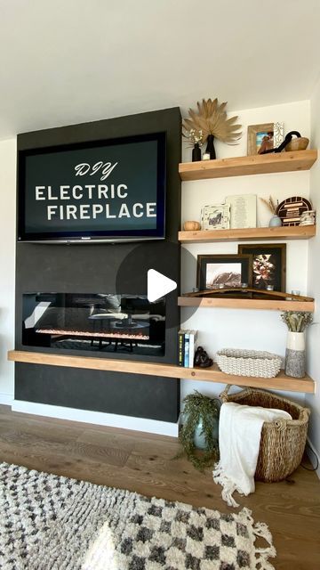 Gabrielle Bourne | Actress & Builder on Instagram: "Part 1 of my DIY electric fireplace + floating shelves build 😍. When your living room is small so you can’t afford to lose any space with a built in, these floating shelves are a great option to create interest!! Follow so you don’t miss part 2 where I show you how I built these floating shelves. 
  ⠀⠀⠀⠀⠀⠀⠀⠀⠀⠀⠀⠀
#girlswhobuild #floatingshelves #portola #romanclay #blackeverything #diy #diyfireplace #doityourself" Floating Mantle Fireplace, Fireplace Floating Shelves, Diy Electric Fireplace, Living Room Built Ins, Diy Fireplace, Living Room Diy, Electric Fireplace, Built Ins, Floating Shelves