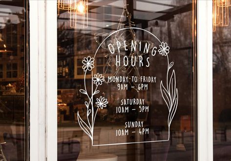 Custom opening hours vinyl decals for shop windows. Add your own text & logo. #openinghours #vinyldecals . #Window_Signs_For_Business #Window_Lettering_Design #Cute_Retail_Display #Floral_Window_Decal Chalkboard Signs Business Flower, Vinyl Window Decals Cafe, Store Front Window Decal, Shop Window Stickers Circle, Decals Store Window, Shop Window Writing, Open A Gift Shop, Shop Window Signage, How To Open A Shop