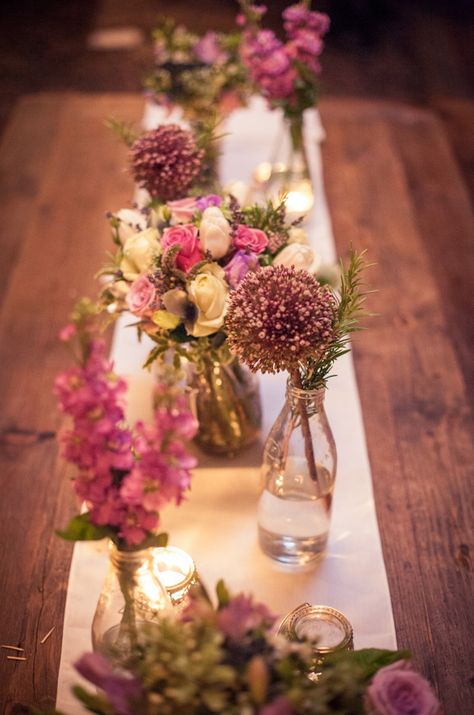 Milk Bottle Flowers Miss Victoria's Floral Emporium Flowers In Milk Bottles, Simple Wedding Table Flowers, Milk Bottle Centerpiece, Milk Bottle Flowers, Milk Bottle Decor, Romantic Tablescape, Bottle Flowers, Bottle Decor, Milk Bottles