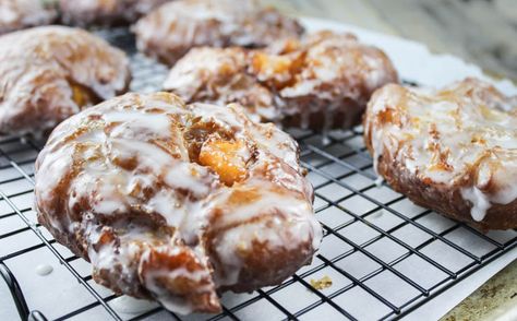 Cooked & Glazed Peach Fritters Peach Fritters, Whiskey Glaze, Glazed Peaches, Maple Whiskey, Peach Whiskey, Dessert Chef, Sweet Glaze, Homemade Doughnuts, Fritter Recipes