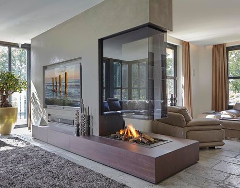 Modus Fireplaces on Instagram: “Bespoke 3 sided fireplace using glass for visual transparency, wrap around furniture base and concrete effect wall finish...simply…” Contemporary Gas Fires, 3 Sided Fireplace, Fireplace Dimensions, Fireplace Outdoor, Two Sided Fireplace, Double Sided Fireplace, Glass Fireplace, Contemporary Fireplace, Fireplace Ideas