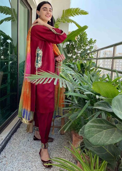 Color: Red Fabric: Kurta: Raw silk Dupatta: Chiffon Work Technique: Featuring intricate gota work Description: Our crimson pocket kurta with cuffed shalwar and multi colored chunri dupatta featuring intricate gota work from our latest Festive Collection ‘20. It is a 3 piece stitched outfit. Includes: Kurta Shalwar Dupatta Saheefa Jabbar Khattak, Pocket Kurta, Asian Wedding Dress Pakistani, Luxury Pret, Asian Wedding Dress, Eid Outfit, Gota Work, Gaun Fashion, Pakistani Fancy Dresses