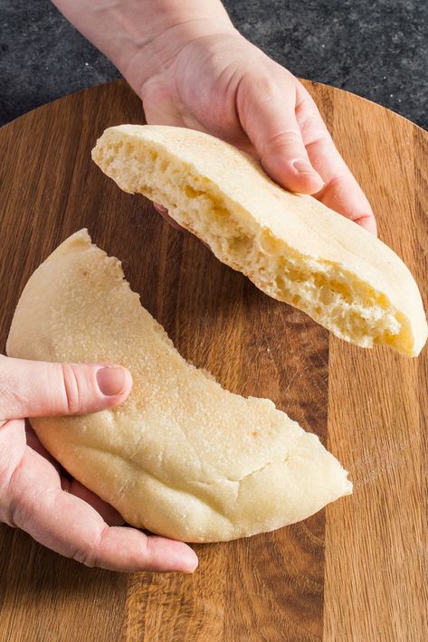 Our thick pita bread starts with high-protein bread flour, which helps to increase its chew. A high hydration level and a healthy amount of olive oil keeps them especially plush. Thick Pita Bread Recipe, Cultural Foods, Pita Bread Recipe, Donut Toppings, Cookie Toppings, Oven Rack, Caramel Tart, Protein Bread, Lebanese Food