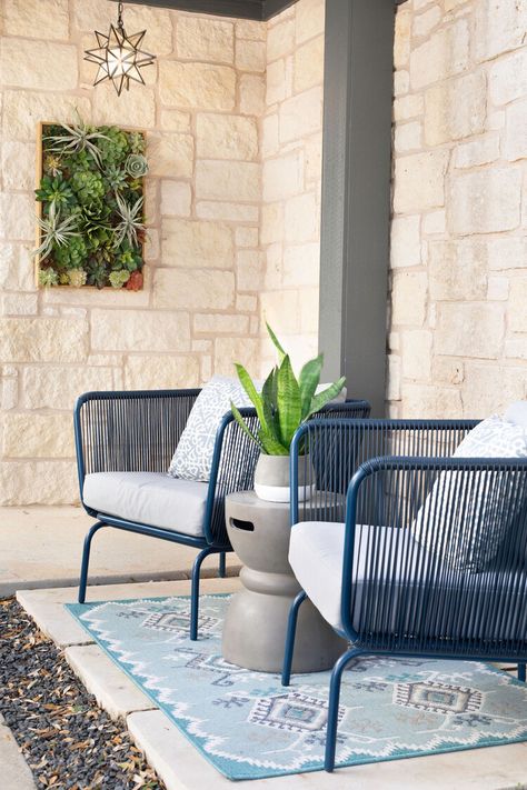 Come on in! We gave this entryway a modern, colorful makeover with a succulent wall, updated front door, pendant lighting, and a cozy seating area to enjoy a cup of coffee #frontentryideas #frontporchideas #blue #eclecticdecor #heynowinteriors Front Door Seating Area Outside, Front House Seating Area, Small Front Patio Ideas Entrance, Front Porch Sitting Area Ideas, Front Door Seating, Front Porch Sitting Ideas, Small Front Porch Seating Ideas, Outside Front Door Entryway Ideas, Front Porch Seating Area