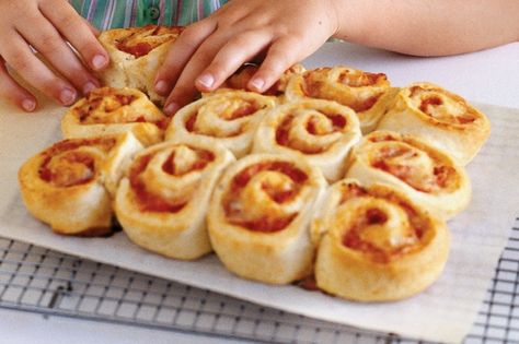 Ham and tomato cheese scrolls, made these last night. instead of the pizza filling i spread garlic butter and sprinkled tasty cheese and some mozzarella cheese and a little bit of parmesan cheese. They turned out really good. Will make them again:)