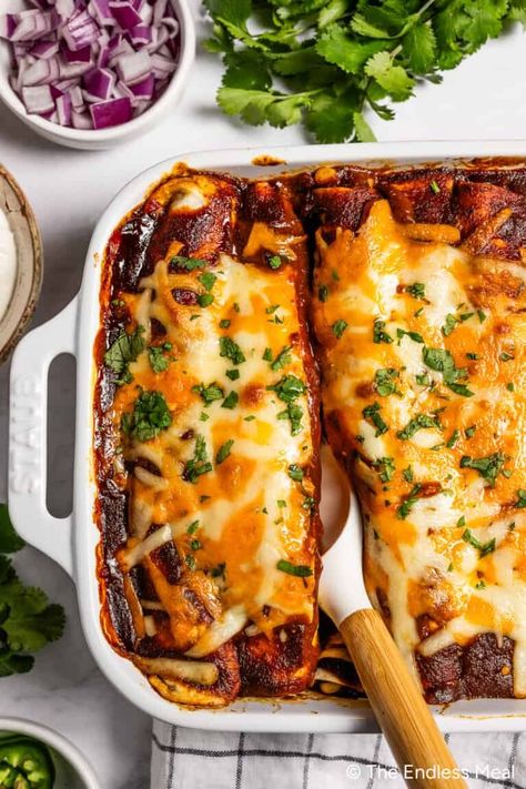 Pulled Pork Enchiladas - The Endless Meal® Pulled Pork Chili, Mexican Fusion, Pulled Pork Leftover Recipes, Pulled Pork Enchiladas, Pork Enchiladas, Dump Recipes, Cheesy Enchiladas, Pork Entrees, Sweet Potato Nachos