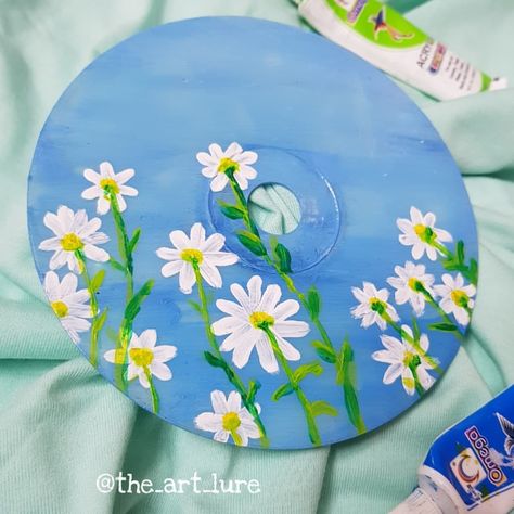 White flowers with green stems in an open blue sky Record Decorations, Monogram Tattoo, Cd Wall Art, Cd Wall, Cd Painting, Cd Art, Diy Home Crafts, Diy Canvas, Light Painting