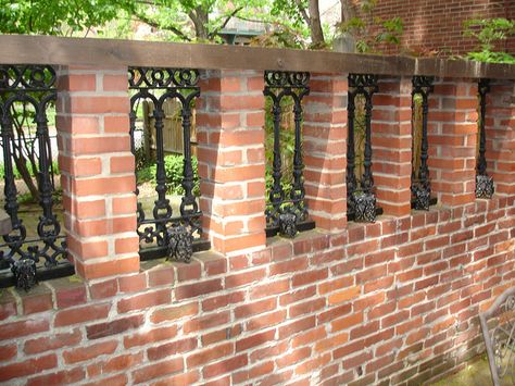 Repurposed wrought iron porch sections now "windows" in our brick fence. Brick Fence Ideas, Brick Wall Fence, Brick Fences, Brick Wall Gardens, Home Fencing, Brick Fence, Wrought Iron Fences, Front Yard Fence, Privacy Walls