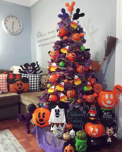 25 Halloween Trees that Will Convince You to Put Your Christmas Tree Up Today - Disney-Themed Halloween Tree - A Halloween tree is a great way to show off a collection of similar items, such as the Disney Halloween decorations featured on this tree. I also love the felt candy corn ornaments here. Halloween Ornaments Tree, Disney Halloween Diy, Disney At Home, Felt Candy, Disney Candy, Mickey Mouse Wreath, Disney Halloween Decorations, Nightmare Before Christmas Tree, Halloween Christmas Tree