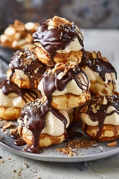 Profiteroles are elegant and delicious cream-filled pastries that are perfect for any occasion! 🥐🍰 Made with light and airy choux pastry, filled with luscious cream, and often topped with a rich chocolate glaze, these treats are a delightful blend of sweet and creamy textures. Easy to make and always a hit, Profiteroles are perfect for special celebrations or a luxurious dessert. Indulge in these classic French pastries today! 😋✨ #Profiteroles #FrenchPastry #ElegantDesserts #SweetTreats Profiteroles Recipe, Buttered Noodles Recipe, Chicken Pie Recipe, Pastry Cream Filling, Delicious Seafood Recipes, Choux Pastry, Elegant Desserts, Delicious Cream, Halal Recipes