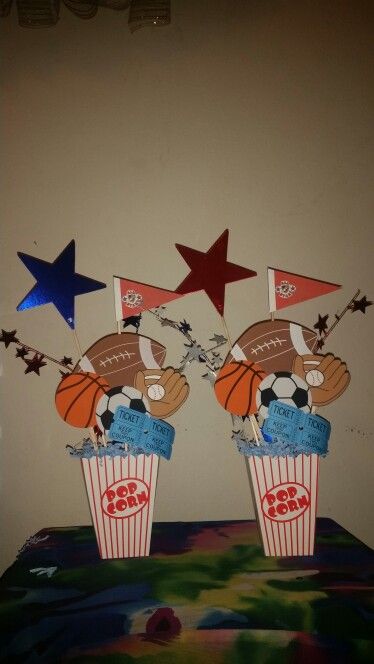 All-stars / sports centerpieces Sports Party Centerpieces Diy, Sports Centerpieces Diy, Sports Birthday Centerpieces, Sports Theme Backdrop, All Star Birthday Party Sports Boys, Sports Themed Centerpieces, Baby Shower Centerpieces For Boys, Sports Party Centerpieces, Sports Centerpieces