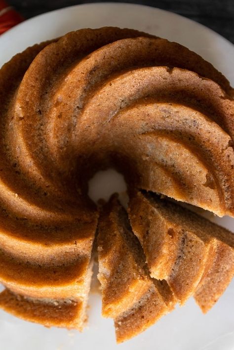 🍏🍎 This Apple Cider Bundt Cake is just what you need when you are looking for an easy, apple-forward flavor in a cake. It's got triple the apple flavoring from using apple cider (I'm sure you've got a bit left over from Thanksgiving) and applesauce in lieu of butter in the batter, and a delicious apple cider glaze to top the cake.🍏🍎🍏 As well, it's so darn easy!  Everything gets whisked together in one bowl.  Gotta love that, right??!! Easy Apple Cider Bundt Cake, Cider Donut Bundt Cake, Apple Cider Donut Cake Yellow Cake, Apple Cider Donut Bundt Cake Recipe, Apple Cider Pound Cake, Doughnut Bundt Cake, Apple Cider Bundt Cake, Cider Bundt Cake, Apple Cider Doughnut Bundt Cake Southern Living