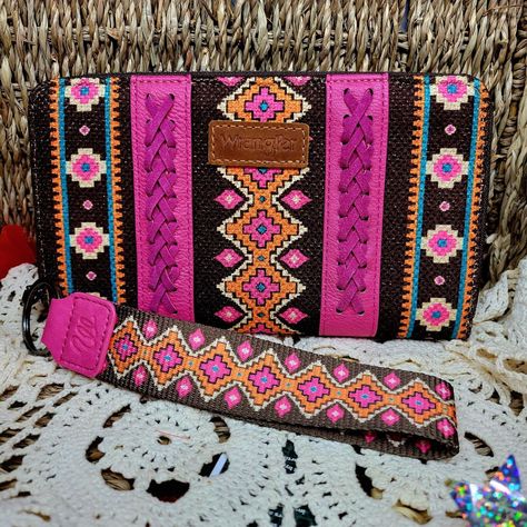 * Wallet, Slim Minimalist Wristlet Wallet Wrangler By Montana West. * Relaxed Attitude Towards Life And Classic Vintage Styling Are Gifts That Wrangler Wants To Bring You! * Wrangler Wallet Womens Gives You Unique Western Aztec Design Elements. * Multiple Card Slots And Money Clip To Keep All Your Belongings Organized Clutch Purse * Canvas Construction * Allover Aztec Pattern Print On Canvas * Whipstitch Details * Wrangler Logo Applique On The Front * Top Zipper Closure * Single Removable Strap Wrangler Wallet, Clutch Pink, Western Aztec, Vintage Styling, Printed Purse, Boho Purses, Aztec Design, Brown Purses, Clip Wallet