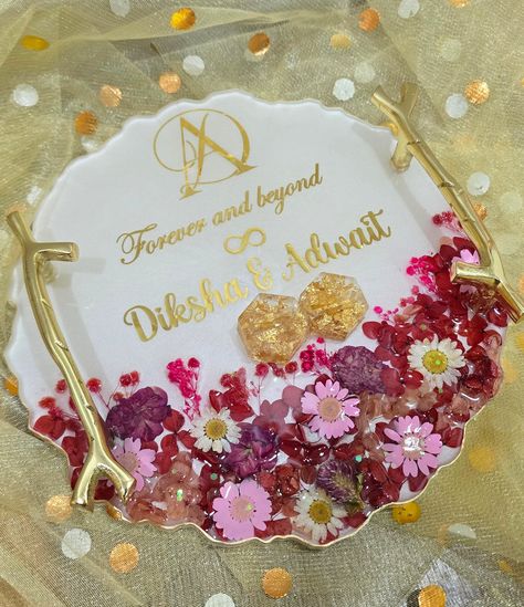 Garden of Love Ring platter - A handcrafted resin engagement ring platter adorned with real flowers—the perfect blend of love and elegance for your special moments 💍🌸 Size, design, colour of flowers are customizable as per choice! DM to inquire or order your Customised Ring platter from @the_handmade_cafe 💌 #ringplatter #ringplatters #ringholder #ringholders #ringtray #ringtrays #ringbox #engagementplatter #woodenplatter #resinplatter #engagementideas #flowertrays #engagementparty #weddin... Resin Ring Platter, Resin Engagement Ring, Engagement Ring Platter, Ring Platter, Wooden Platters, Ring Tray, Resin Craft, Diy Resin Crafts, Resin Ring