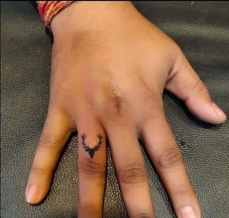 12+ Best Deer Finger Tattoo Designs - PetPress Stag Hand Tattoo, Fox Finger Tattoo, Deer Finger Tattoo, Antler Finger Tattoo, Western Finger Tattoos, Buck Tattoo, Small Deer, Tattoo Wedding Rings, Finger Tattoo Designs