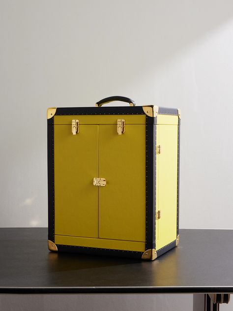 Designed for dinner parties or game nights, Rapport London's 'Cambridge Champagne Trunk' is a portable bar for the home. Crafted from leather, it's lined with smooth suede and has an organised interior with sections to hold two bottles and four glasses. It fastens with vintage-style gold-tone latches and can be stored away neatly when it's not in use. Italian Wardrobe, Tom Ford Bag, Leather Trunk, Portable Bar, Bell & Ross, Game Nights, Luxury Sneakers, Stylish Watches, Driving Shoes