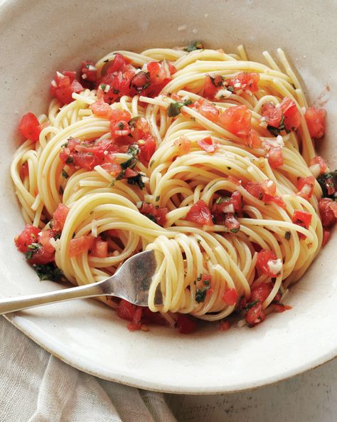 The Most-Pinned Martha Stewart Recipes of 2015 | Martha Stewart Pasta With Fresh Tomatoes, Fresh Tomato Pasta, Fresh Tomato Recipes, Turkey Meatball Recipe, Martha Stewart Recipes, Fresh Tomato Sauce, Tomato Pasta Sauce, Baked Eggplant, Tomato Sauce Recipe