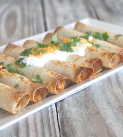 Bean and Cheese Baked Taquitos Prep time: 10 min | Cook time: 20 min | Total time: 30 min Ingredients 15 ounce can Old El Paso Traditional Refried Beans 1 tablespoon Old El Paso Taco Seasoning 1 1/2 cups shredded cheddar cheese 10 Soft Taco Size Flour Tortillas 2 tablespoons olive oil 1/2 teaspoon Old … Bean And Cheese Taquitos, Bean Taquitos, Cheese Taquitos, Homemade Taquitos, Traditional Refried Beans, Baked Taquitos, Refried Bean, Most Pinned Recipes, Picky Palate