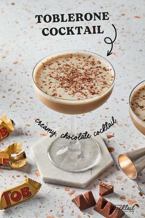 Inspired by the iconic Swiss chocolate, this rum based flip cocktail is made with Baileys, Frangelico and Kahlua. This sweet and creamy chocolate cocktail perfectly mimics the subtle flavors of honey and almond nougat you've grown to love with Toblerone chocolates. Drinks With Frangelico, Chocolate Baileys Cocktail, Frangelico Recipes, Toblerone Cocktail, Fall Martini, Flip Cocktail, Summer Martinis, Liqueur Cocktails, Banana Cocktails