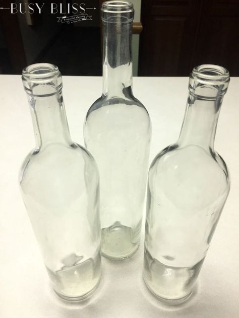 Decorative wine bottles aren’t a new thing. You will find tons of great ideas all over Pinterest when searching “decorative wine bottle DIY”.  They have been on… Decorative Wine Bottles, Mom Crafts, Diy Project Ideas, Liquor Bottle Crafts, Empty Glass Bottles, Empty Wine Bottles, Bottle Diy, Diy Glass Bottle Crafts, Painted Wine Bottles