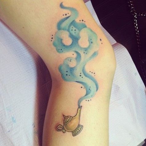 Aladdin tattoo. I love the lamp here, and the magic swirls. Magic Lamp Tattoo, Genie Lamp Tattoo, Fairytale Tattoos, Aladdin Tattoo, Princess Tattoos, Aladdin Magic Lamp, Tattoos Disney, Disney Sleeve Tattoos, Lamp Tattoo