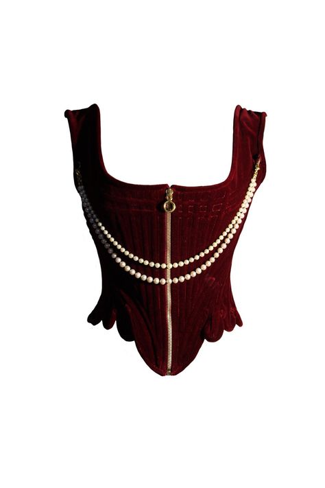 Burgundy velvet corset Victorian style, cinching waist, with double closure on the back with laces and on the front with metal zip for greater speed. The bones are in spiral steel with beautiful crossings on the upper part. Finely hand-finished both outside and inside, thanks also to the jacquard fabric lining. The corset is embellished with two rows of real freshwater pearls. FITS A MEDIUM SIZE. Dark Red Corset Top, Red Corset Outfit, Burgundy Corset, Victorian Inspired Fashion, Bone Corset, Corset Victorian, Red Corset Top, Tulle Corset, Under Bust Corset