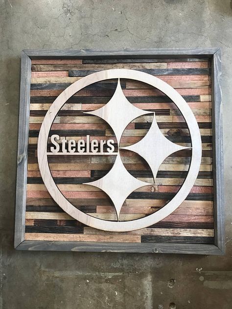 This sign is 100% wood and handmade. Approx. 20x20 and weighs approx. 7lbs. Logos are 16” at their widest length. The logo is given a floating effect by being slightly raised off of the frame. The frame and background are Rustic! Meaning many pieces are reclaimed wood with holes and Steelers Wooden Signs, Steelers Diy Gifts, Steelers Decor, Car Parts Decor, Rustic Wood Wall Decor, Rustic Wood Wall, Shed Home, Laser Projects, Laser Engraved Ideas