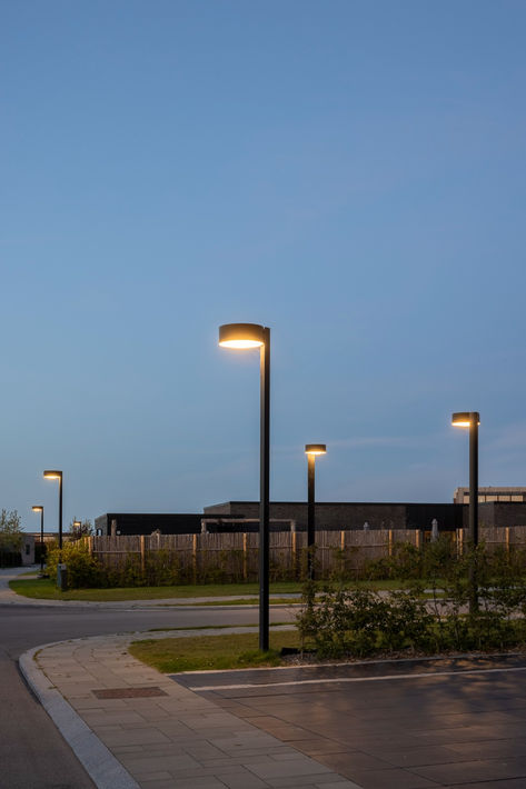 Streetlighting in a residential area with several KILDEBJERG lamp posts Street Lights, Street Light Design, Residential Lighting, Light Pollution, Street Lamp, Urban Spaces, Post Lights, Street Light, Landscape Lighting