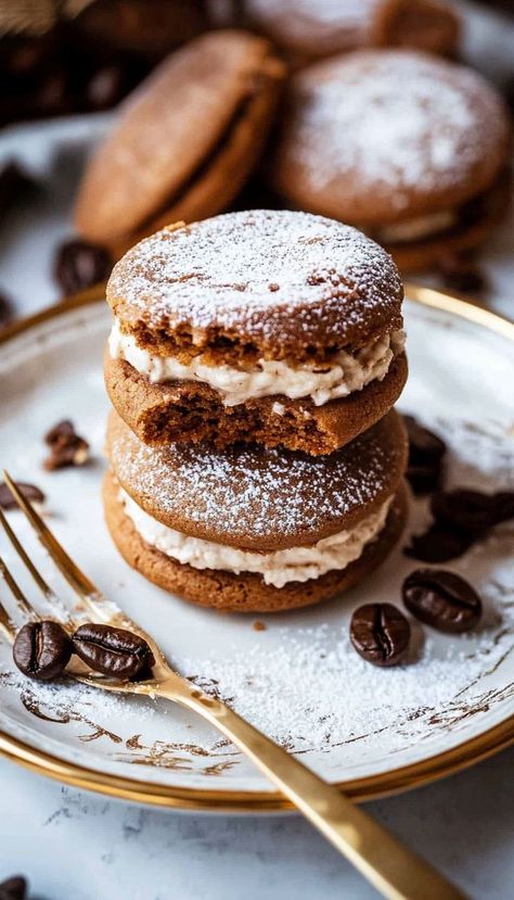 Indulge in these coffee-infused cookies filled with a rich mascarpone cream. Perfectly balanced with bold coffee flavor and creamy filling, they’re an elegant treat for fall dessert lovers. Serve them with your favorite latte or cappuccino for a cozy pairing that’s perfect for chilly evenings or holiday gatherings. Coffee Themed Desserts, Cappucino Cookies, Coffee Flavored Desserts, Infused Cookies, Coffee Flavored Cookies, Mascarpone Filling, Moon Pie, Coffee Desserts, Moon Pies