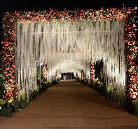 Latest entry walkways for outdoor wedding | Modern wedding entrance themes | Inspiring entry walkway themes for outdoor wedding | Modern wedding | Latest outdoor wedding ideas Wedding Walkway, Indian Wedding Decorations Receptions, Wedding Gate, Reception Entrance, Gate Decoration, Wedding Hall Decorations, Wedding Reception Backdrop, Wedding Entrance Decor, Wedding Stage Design