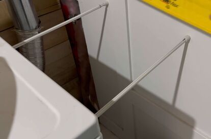 Learn how to create a stylish and functional DIY laundry room shelf with tension rods and simple materials. Budget-friendly and easy to build! Diy Laundry Room Shelf, Diy Laundry Room Shelves, Laundry Room Shelf, Diy Laundry Room, Laundry Room Storage Shelves, Laundry Shelves, Tension Rods, Room Shelf, Laundry Room Shelves