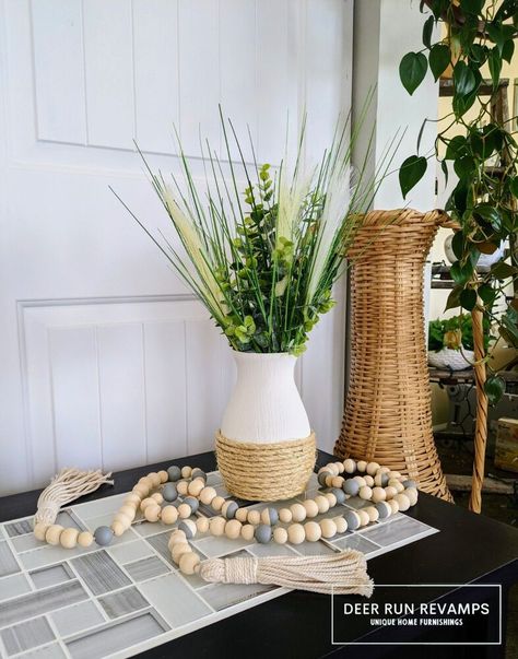 If you love boho chic style check out these 25 decor ideas on a budget for decorating your living room, bedroom, entryway and kitchen for cheap. Boho Baskets, Boho Decorations, Western Bedrooms, Boho Store, Diy Wood Wall, Centerpiece Vase, Vase Centerpiece, Boho Vase, Pottery Barn Inspired