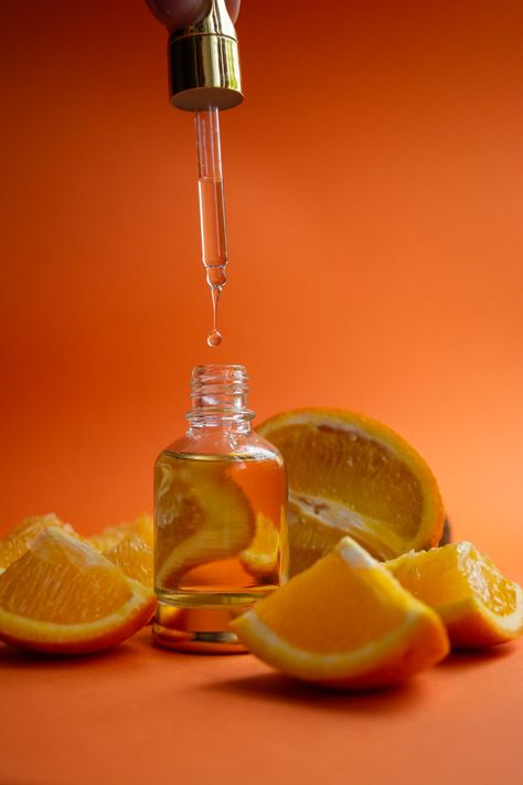 Beauty Oil Photography, Orange Skincare Aesthetic, Essential Oil Product Photography, Essential Oils Photography, Essential Oil Photography, Orange Skincare, Orange Cosmetic, Oil Photography, Photography Cosmetics