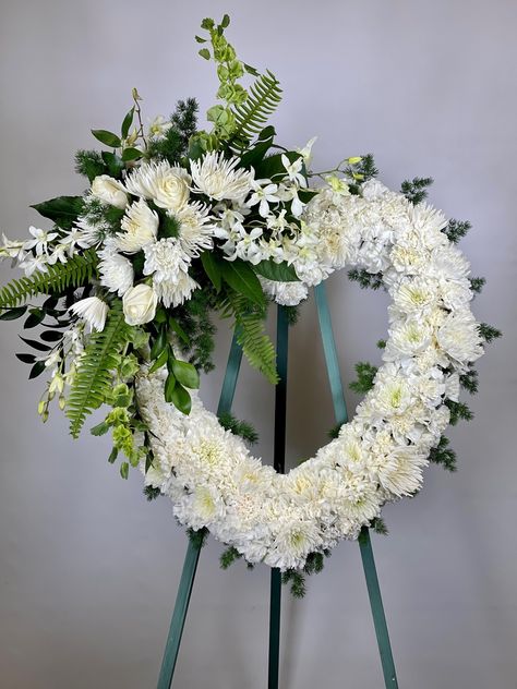 This gorgeous, all white heart tribute is a wonderful symbol of eternal life and sweet serenity.  SKUs: ,sym-t-4a, sym-t-4b, sym-t-4c Flower Arrangements Heart Shape, Condolence Flowers Floral Arrangements, Heart Sympathy Arrangements, Cremation Urn Flowers Wreaths, Condolence Flowers, Heart Casket Sprays, Casket Flowers, Sympathy Arrangements, Casket Sprays