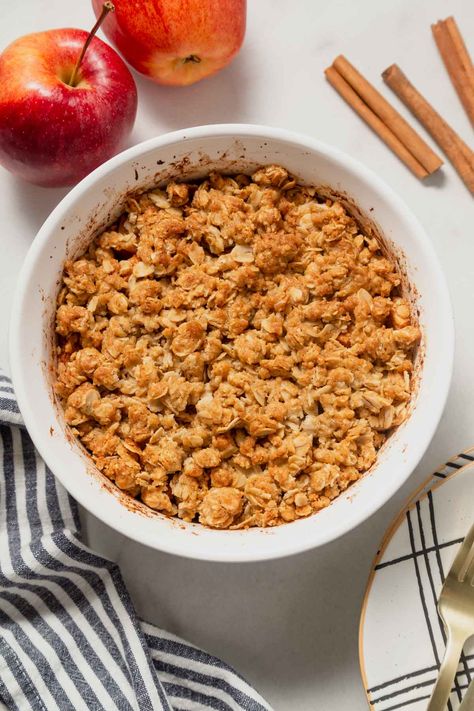 The perfect Fall dessert, this Air Fryer Apple Crisp For Two combines tender apples with a crunchy topping. This classic and easy dessert made in the Air fryer is quick and insanely delicious! Airfry Apple Dessert, Single Serve Apple Crisp Air Fryer, Air Fryer Apple Crumble Recipe, Air Fryer Crumble, Airfryer Apple Crumble, Apples Air Fryer, Air Fryer Desserts Easy Recipes, Air Fryer Apple Crisp Recipe, Air Fryer Apple Crumble