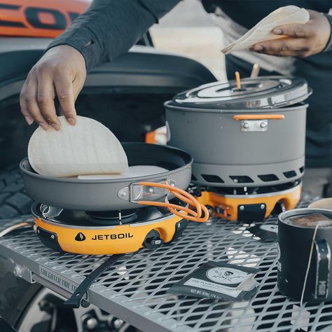 Jetboil Genesis Basecamp Backpacking and Camping Stove Cooking System with Camping Cookware Jetboil's Genesis Basecamp portable propane stove features a dual-burner design that functions as a standalone camping stove or couples with other Jetlink-compatible stoves or a Luna satellite burner to create an outdoor cooking range. Camping Setup Ideas, Gluten Free Camping, Camp Stove Cooking, Best Camping Stove, Camping Setup, Camping Cooker, Camping Pot, Cooking For A Group, Propane Stove