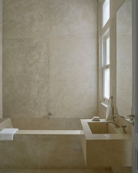 Carlos Aparicio on Instagram: "My Buenos Aires bathroom. One idea, one material. Precise, always takes my breath away. To find this ‘block of stone ‘ within the inner sanctum of this grand neoclassical apartment Is extraordinary .#architecture #interiordesign #interiorarchitecture #bathroomdesign #buenosairesrecoleta #limestone @gallery_bac" Neoclassical Apartment, Limestone Bathroom, Inner Sanctum, Country House Design, Stone Blocks, Take My Breath, Bathroom Inspo, Beautiful Bathrooms, Neoclassical