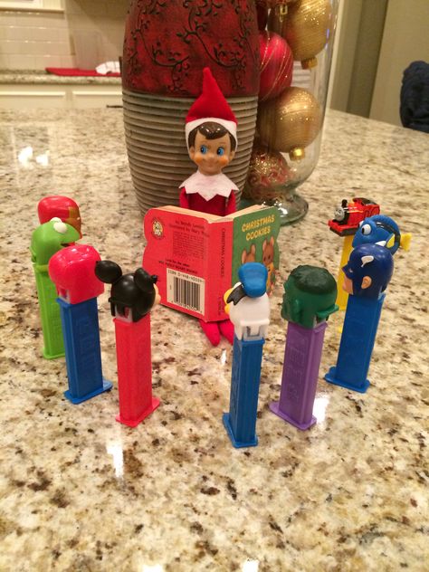 Reading to Pez friends Pez Dispensers, Shelf Ideas, On The Shelf, Elf On The Shelf, Grinch, Elf, Holidays, Candy, Reading