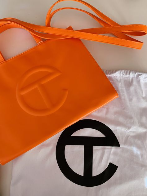 #telfar #blackownedbusiness #luxurylifestyle #orange Telfar Bag Unboxing, Orange Telfar Bag, Orange Telfar, Orange Handbags, Telfar Bags, Telfar Bag, Orange Purse, Handbag Essentials, Popular Handbags