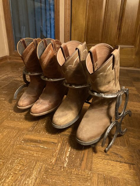 This handmade, durable, rustic, and unique design is made with USED and cleaned horseshoes from a local farrier in West Alabama! It holds 2 pair of boots.

! Horseshoe Boot Rack, Cowboy Home Decor, Leather Christmas Gifts, Boot Holder, Horseshoe Crafts Projects, Welding Crafts, Boot Rack, Usa Shoes, Boot Stand