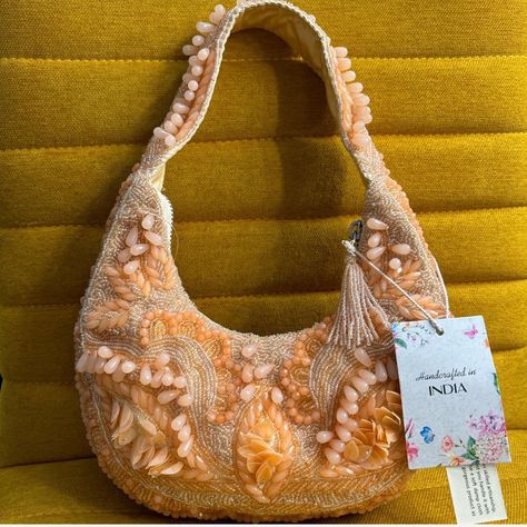 Brand New With Tags (Nwt) Peach Orange Pink Pearl Beaded Purse Size: Brand: Description Beautiful Pearl Hand Beaded Shoulder Bag Multiple Types Of Beads 3d Floral Design In The Beading Thick Beaded Strap Zipper Closure - Perfect For A Europe Trip Because Of The Secure Closure Bead, Sequin, Rhinestone Detailing Baguette Shoulder Bag Shoulder Bag Hand Made In India Reminds Me Of Bags Similar To The Staud Beaded Bag, Zara Pearl Clutch Bag, And Anthropologie Fiona Beaded Shoulder Purse Similar Desig Diy Beaded Purse, Staud Bags, Indian Bags, Pearl Clutch Bag, Black Quilted Bag, Zara Purse, Beaded Shoulder Bag, Brand Description, Bag Zara