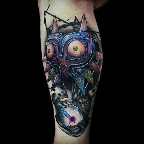 50 Majora’s Mask Tattoo Designs For Men - The Legend Of Zelda Ideas Majora's Mask Tattoo, Nintendo Tattoo, Tattoo Fixes, Video Game Tattoos, Berlin Tattoo, Zelda Tattoo, Gamer Tattoos, Video Game Tattoo, Geek Tattoo