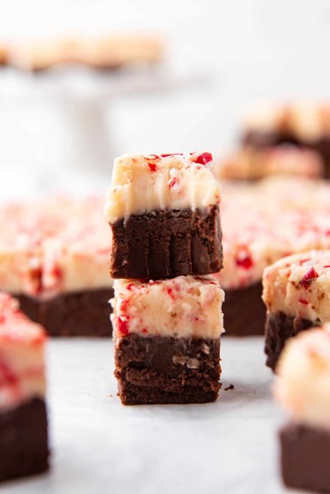 Peppermint Bark Fudge is just like our favorite seasonal candy made with white chocolate, dark chocolate, and crushed candy canes, but in fudge form! Our peppermint bark fudge is made the old-fashioned way on the stovetop with a candy thermometer so it's perfectly thick, soft, and fudgy! | peppermint bark fudge recipe | white chocolate peppermint bark fudge | festive peppermint bark fudge recipe Peppermint Bark Fudge Recipe, Christmas Peppermint Bark, Peppermint Bark Fudge, White Chocolate Peppermint Bark, Peppermint Bark Recipes, Bark Recipes, Chocolate Peppermint Bark, Peppermint Fudge, White Chocolate Peppermint