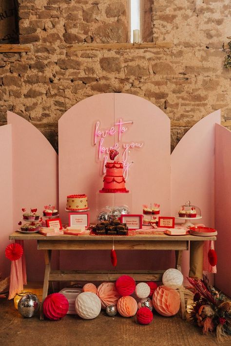 Dessert wedding table with pink screen backdrop and pink neon sign with a two tier hot pink and red retro wedding cake with paper lanterns and disco ball decor Retro Wedding Cakes, Wedding Platform, Red Desserts, Pink Neon Sign, Metallic Wedding, Vegan Wedding, Honeymoon Fund, Rock My Wedding, Neutral Wedding