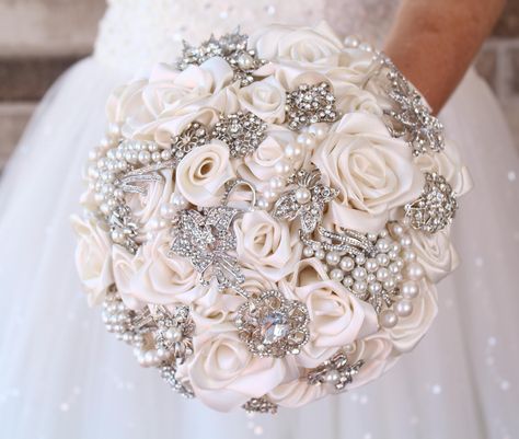 BROOCH BOUQUET ivory , silver jeweled with crystals and pearls, alternative bridal broach boquet The last picture in this listing will help you to choose the size. Perfect for your glamour wedding theme Please kindly note that measurements are made by the bottom diameter Shape of brooches is subject to change upon availability Such bouquet will be perfect for anniversary Diamond Theme Wedding, Bling Wedding Bouquet, Diamond Wedding Theme, Jewelry Bouquet, Bling Bouquet, Forever Flower, Wedding Flower Jewelry, Jeweled Bouquet, Random Products